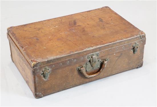 A Louis Vuitton leather suitcase, 28 x 19 x 8.5in.